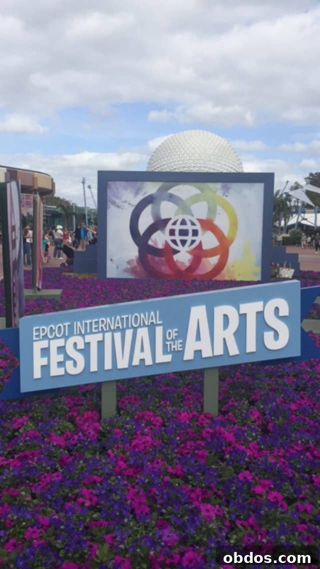 Κορίτσι που κοιτάζει έργα τέχνης στο Epcot International Festival of the Arts