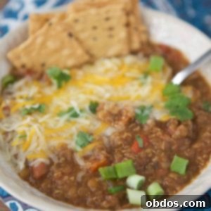 Μπολ χορτοφαγικού τσίλι Instant Pot με τυρί και φρέσκο κρεμμυδάκι