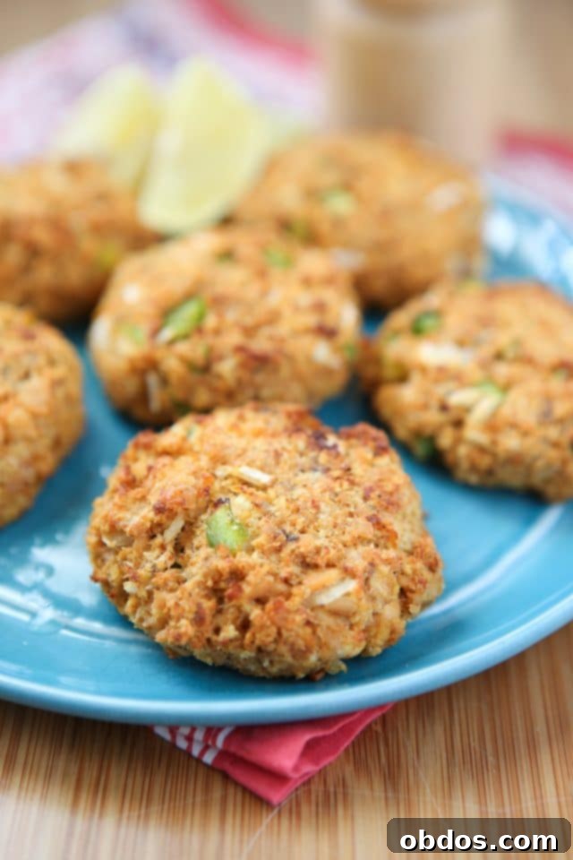 Cajun Baked Salmon Cakes - great for lunches or dinner. I love making these for meal prep and having them ready all week. Recipe via aggieskitchen.com